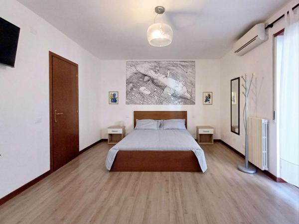 Nottetempo Verona : photo 10 de la chambre chambre de luxe (2 adultes + 1 enfant) avec salle de bains commune