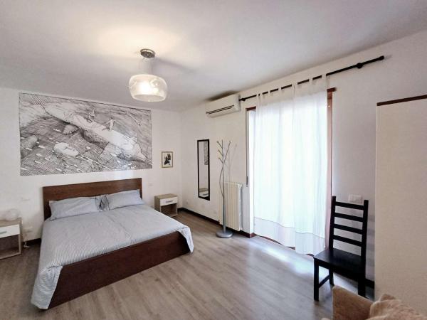 Nottetempo Verona : photo 8 de la chambre chambre de luxe (2 adultes + 1 enfant) avec salle de bains commune