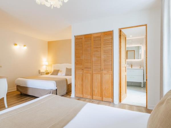 Demeures & Châteaux - Hôtel De La Porte Saint-Malo : photo 1 de la chambre chambre quadruple