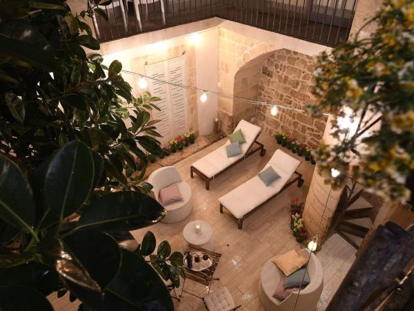 Palazzo Guido : photo 3 de la chambre suite lit queen-size avec baignoire spa