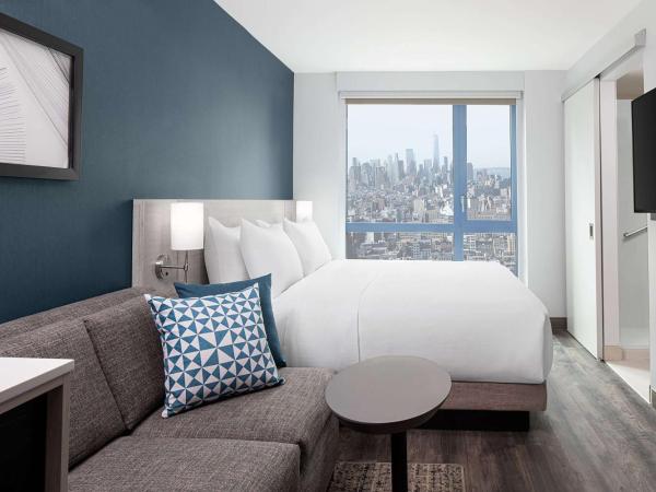 Hyatt Place New York Chelsea : photo 1 de la chambre chambre lit king-size avec canapé-lit - vue sur horizon