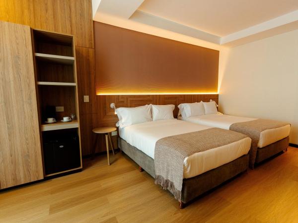 Brizo Salta : photo 2 de la chambre chambre double supérieure avec deux lits doubles