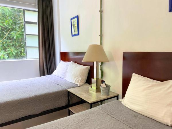 VL Hotel Boutique Consulado Chapu Guadalajara : photo 1 de la chambre chambre quadruple classique