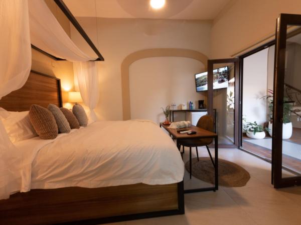 Casa Victoria Malecón - Adults Only : photo 2 de la chambre chambre deluxe