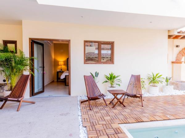 Casa Victoria Malecón - Adults Only : photo 4 de la chambre chambre lit king-size - vue sur piscine