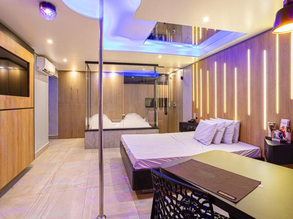 EUPHORIA MOTEL : photo 2 de la chambre suite deluxe avec baignoire spa