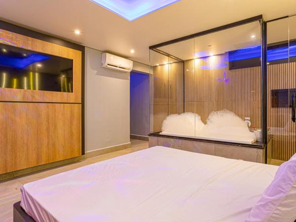 EUPHORIA MOTEL : photo 8 de la chambre suite deluxe avec baignoire spa