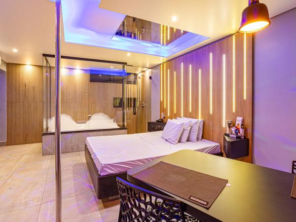 EUPHORIA MOTEL : photo 3 de la chambre suite deluxe avec baignoire spa