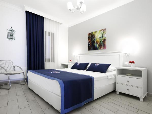 Rodina Suites Hotel : photo 3 de la chambre suite avec balcon