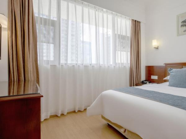 深圳江苏宾馆 : photo 2 de la chambre chambre triple supérieure