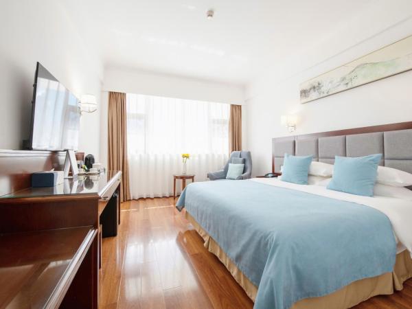 深圳江苏宾馆 : photo 1 de la chambre chambre standard lit queen-size