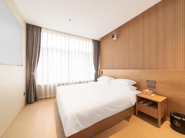 Captain 5 Youth Hotel-Xianxia Road Branch : photo 1 de la chambre chambre standard lit queen-size