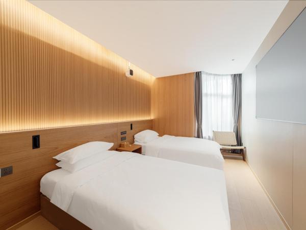 Captain 5 Youth Hotel-Xianxia Road Branch : photo 1 de la chambre chambre lits jumeaux Économique