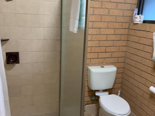 Aspley Pioneer Motel : photo 3 de la chambre chambre lit queen-size 