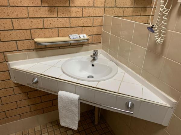 Aspley Pioneer Motel : photo 5 de la chambre chambre lit queen-size 