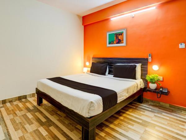 Hotel O PMR Hotel : photo 1 de la chambre chambre triple classique