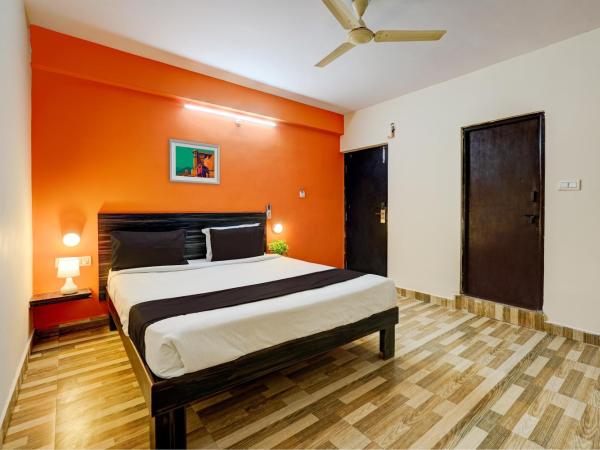 Hotel O PMR Hotel : photo 7 de la chambre chambre triple classique