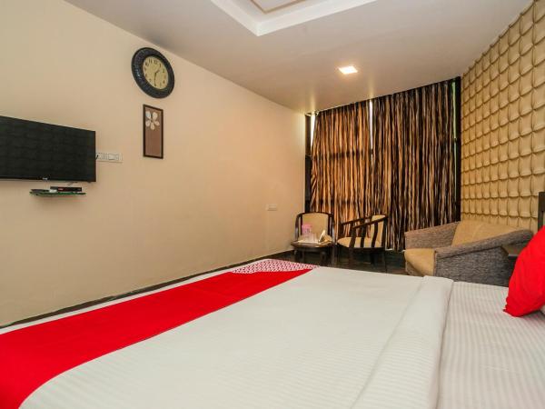 Super Collection O Indian Suites Near Sitara Restaurant : photo 7 de la chambre chambre double standard