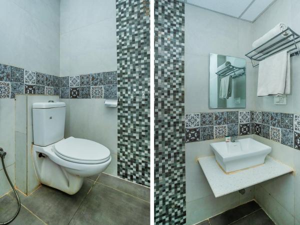 Super Collection O Indian Suites Near Sitara Restaurant : photo 8 de la chambre chambre double standard