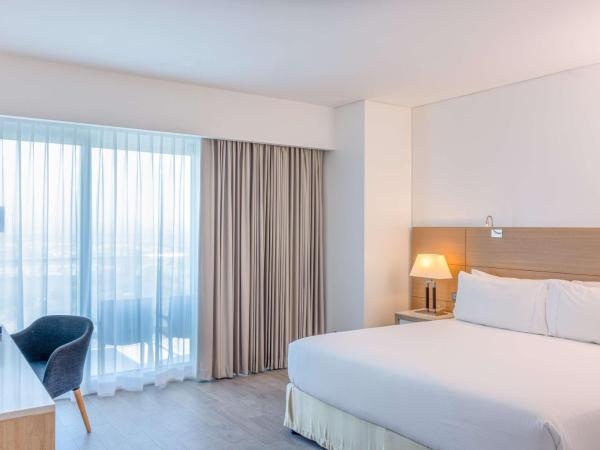 DoubleTree by Hilton Mazatlan, SIN : photo 5 de la chambre suite junior lit queen-size - vue sur ville