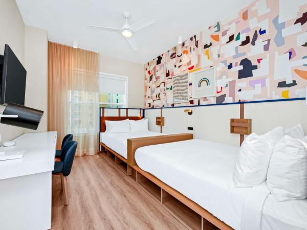 Embassy Suites By Hilton Orlando Sunset Walk : photo 3 de la chambre two-bedroom premium corner king suite with two queen beds