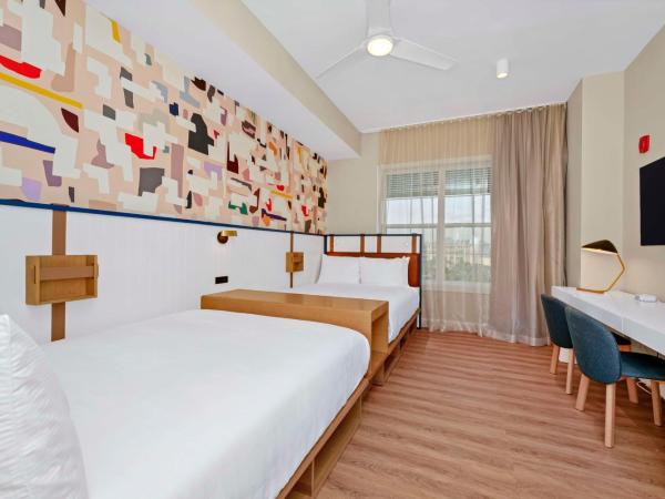 Embassy Suites By Hilton Orlando Sunset Walk : photo 6 de la chambre two-bedroom king suite with two queen beds and balcony