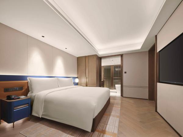Doubletree By Hilton Beijing East Third Ring Road : photo 6 de la chambre suite deluxe avec lit king-size