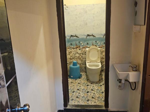 Hotel Simra Relax inn : photo 1 de la chambre chambre double avec salle de bains privative