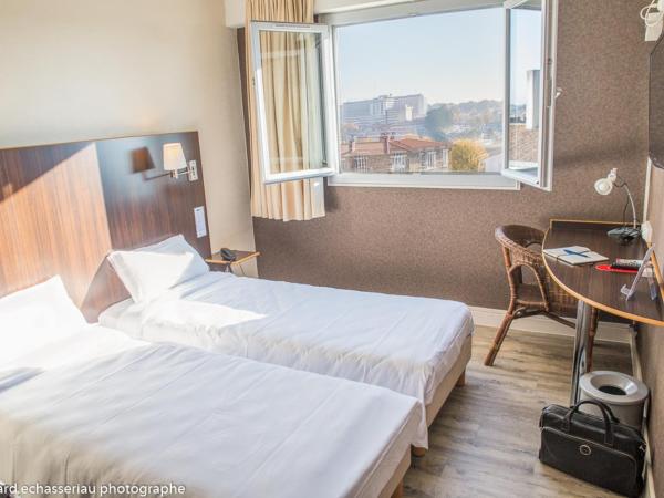 Hôtel de la Vendée : photo 2 de la chambre chambre lits jumeaux avec douche