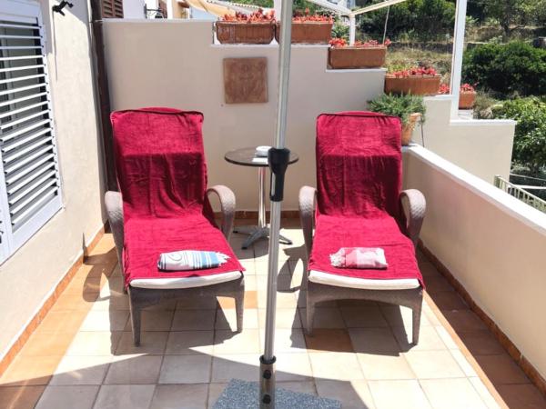 La Reginella Capri : photo 3 de la chambre chambre double ou lits jumeaux supérieure - vue sur mer