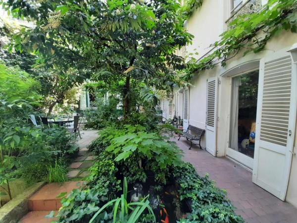 Chambre calme sur jardin Paris Batignolles : photo 1 de la chambre chambre double avec salle de bains privative