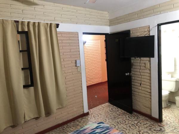 Hotel el Bucanero : photo 1 de la chambre chambre lit queen-size