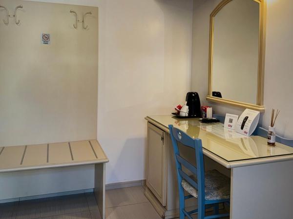 Baia Sangiorgio Hotel & Beach Club : photo 8 de la chambre chambre double ou lits jumeaux - vue sur jardin