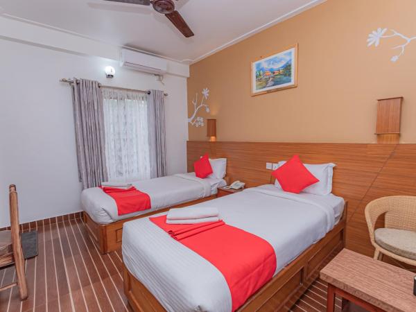 Basundhara Resort Pokhara : photo 4 de la chambre chambre lits jumeaux deluxe