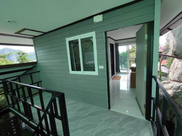 Kitty Guesthouse : photo 2 de la chambre chambre lit queen-size avec balcon