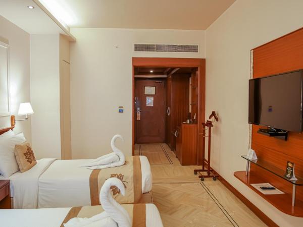Clarion Bella Casa at Airport : photo 9 de la chambre chambre double ou lits jumeaux club