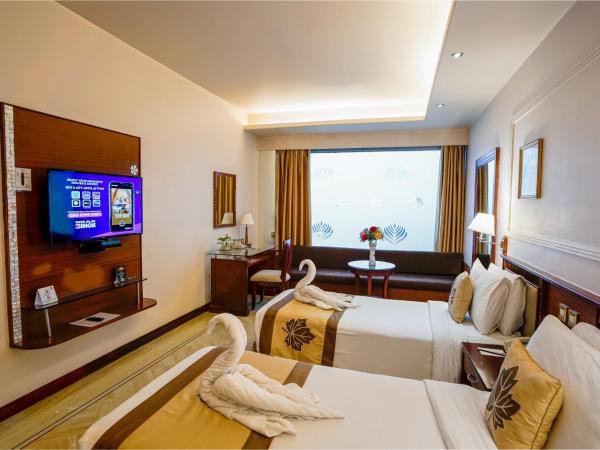 Clarion Bella Casa at Airport : photo 3 de la chambre chambre double ou lits jumeaux club