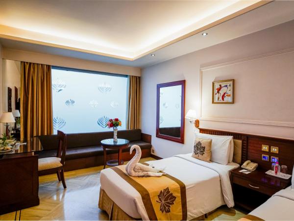 Clarion Bella Casa at Airport : photo 2 de la chambre chambre double ou lits jumeaux club