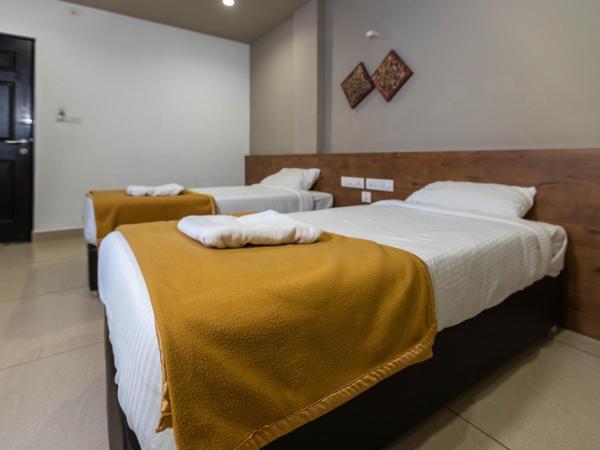 Aryaas Residency Nettoor : photo 1 de la chambre chambre double