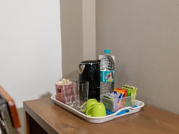 Aryaas Residency Nettoor : photo 3 de la chambre suite