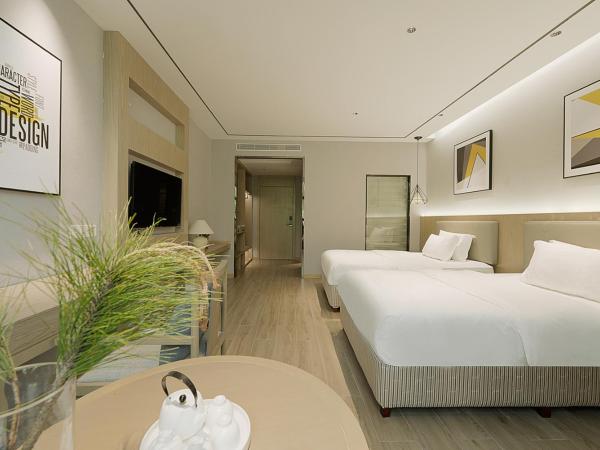 凯瑞汀酒店 重庆西站巴国城店 : photo 6 de la chambre chambre lits jumeaux supérieure