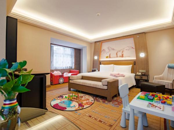 Chengdu Tibetan Hotel-Free Welcome Tibetan Tea : photo 1 de la chambre tibetan family room-three peopletibetan tea free experience