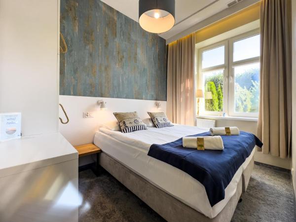 SeaSide Sopot - tuż przy plaży : photo 5 de la chambre chambre deluxe (2 adultes + 1 enfant)