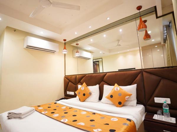 Hotel Leo Saffron - Corporate Stay Pitampura : photo 5 de la chambre chambre double deluxe avec balcon