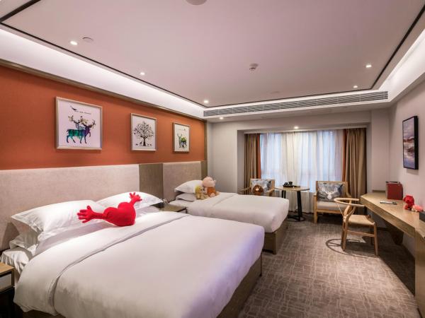 凯瑞汀酒店总部城店 : photo 4 de la chambre chambre familiale deluxe