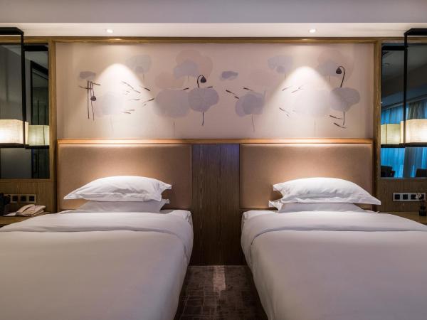 凯瑞汀酒店总部城店 : photo 2 de la chambre chambre double supérieure