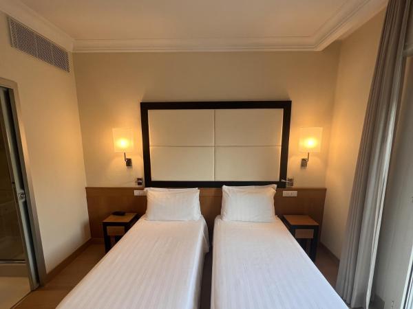 Hotel Daniel & Ristorante Cocchi : photo 2 de la chambre chambre lits jumeaux