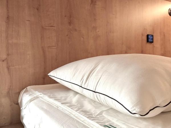 The POD Suite Hostel Village : photo 4 de la chambre b20 mixed upper bed in shared room with 20 beds