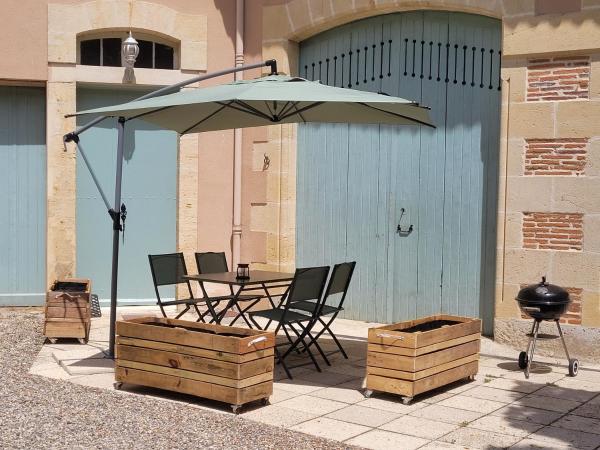 Le Portail : photo 7 de la chambre chambre double ou lits jumeaux - vue sur jardin