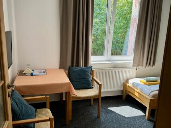 Penzion Kozí Horka u Brněnské přehrady : photo 5 de la chambre chambre double ou lits jumeaux standard - vue sur jardin